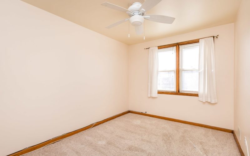 3501 Northway Drive, beige bedroom with ceiling fan