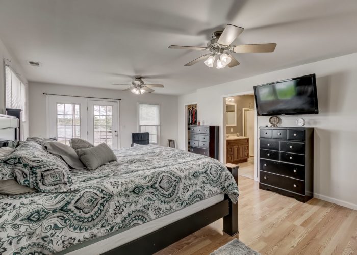 8134 Bullneck Road, master bedroom with two ceiling fans