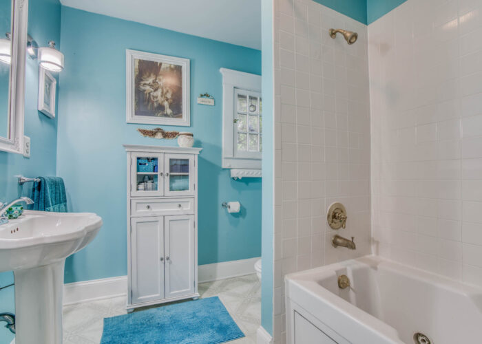 33 E. Seminary Avenue, blue bathroom tile shower