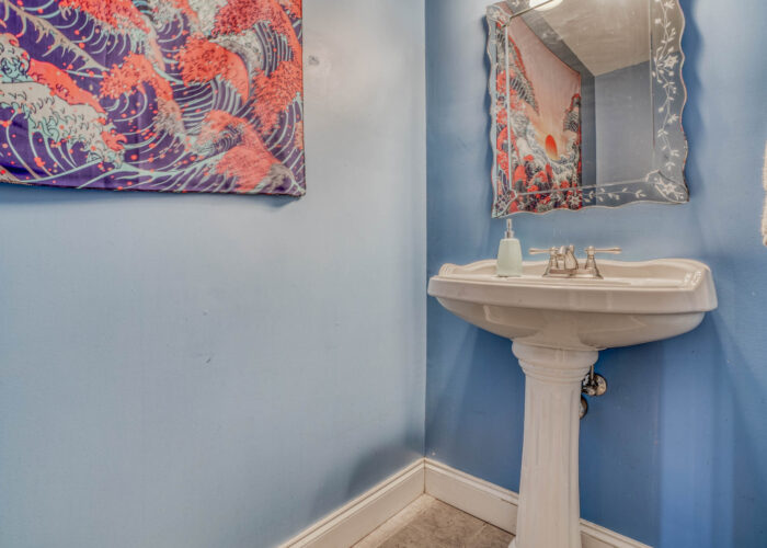 3301 E Baltimore St, blue powder room with pedestal sink