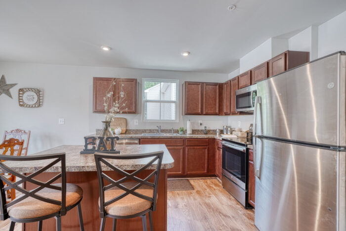 4 Shire Hall Ct., kitchen with cabinets and island breakfast bar