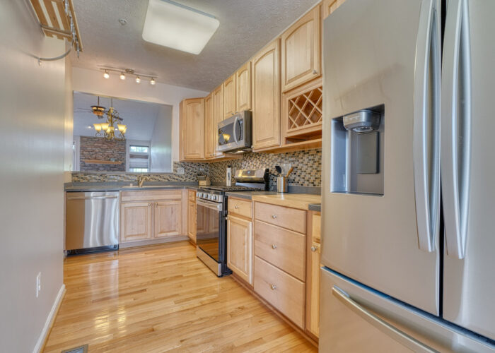 4900 Villa Point, refrigerator and the rest of the kitchen